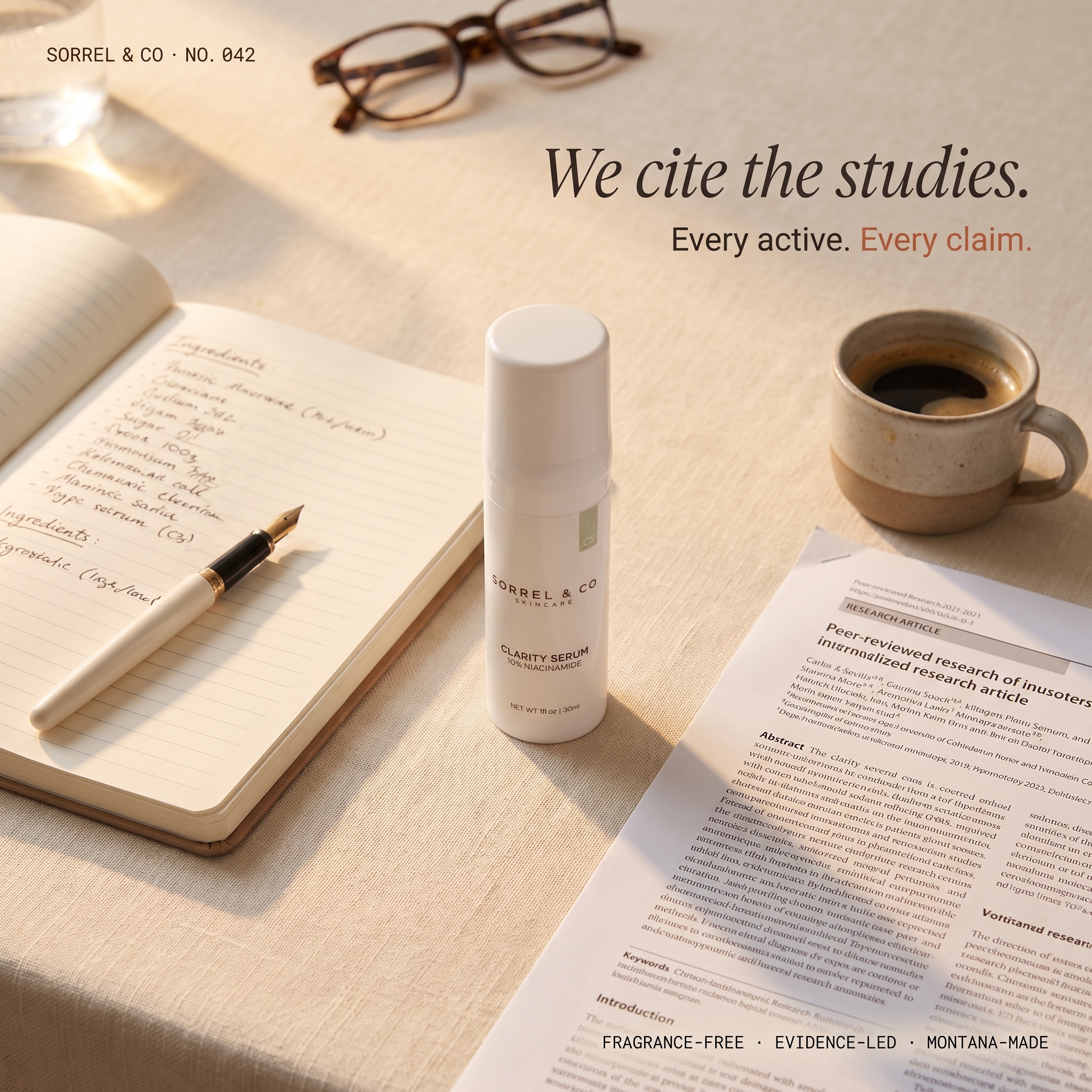 Sorrel & Co concept B1 — desk vignette with notebook, Clarity Serum, espresso, research paper. Copy 'We cite the studies. Every active. Every claim.'